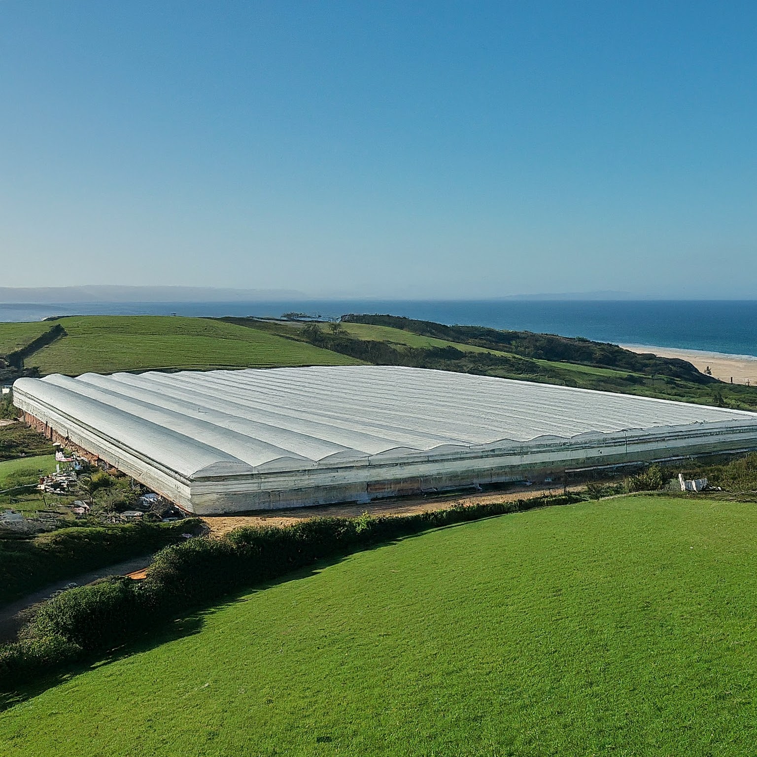 Coastal polyhouse aerial view